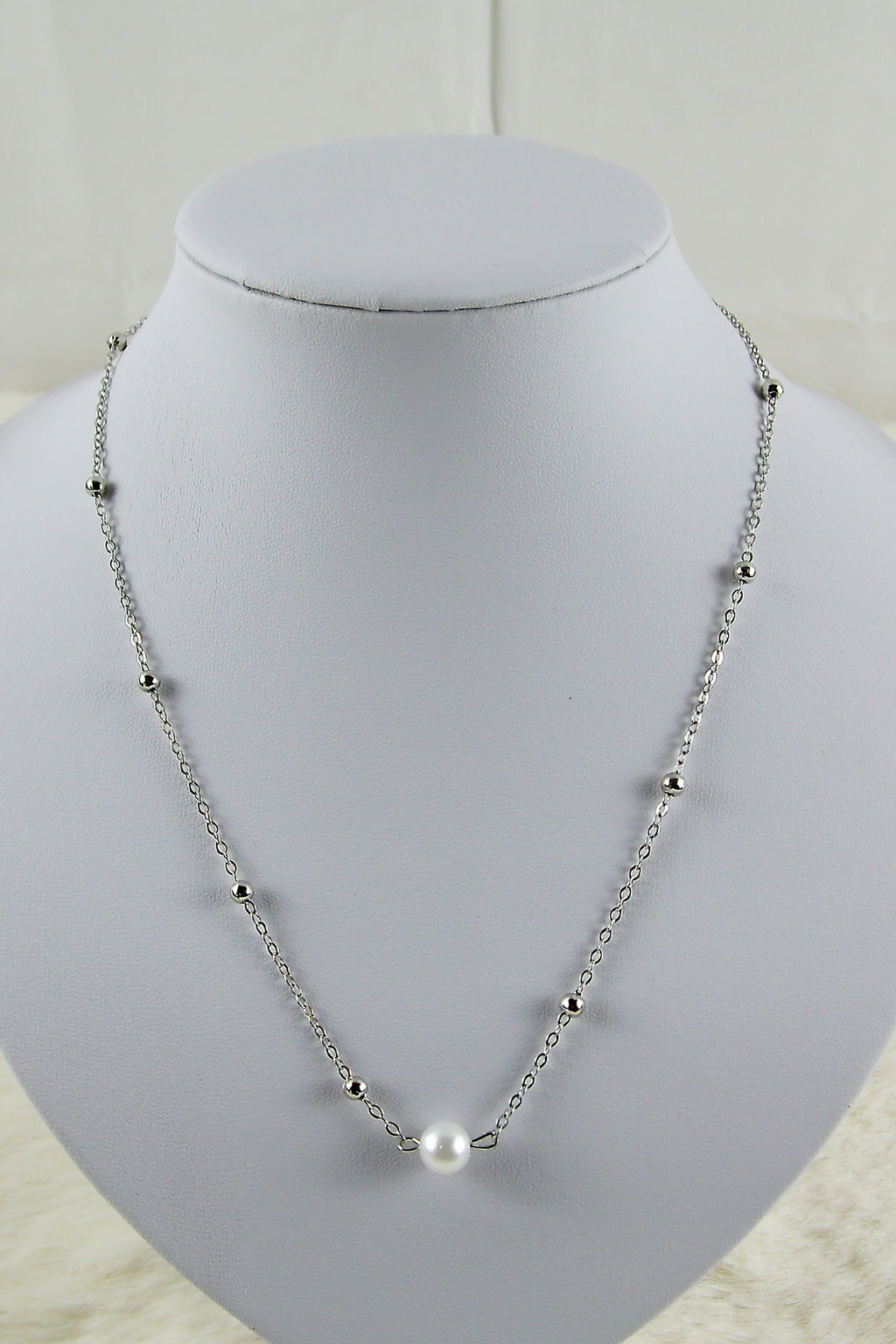 Zilveren ketting met witte parel