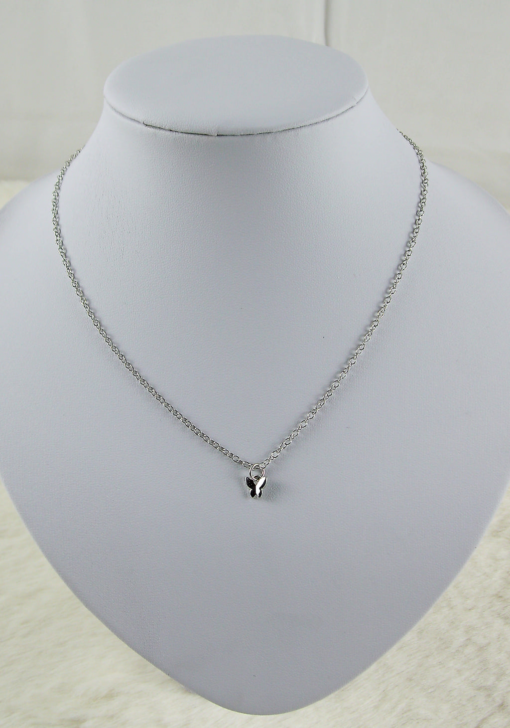 Zilveren ketting met mini vlinder hanger
