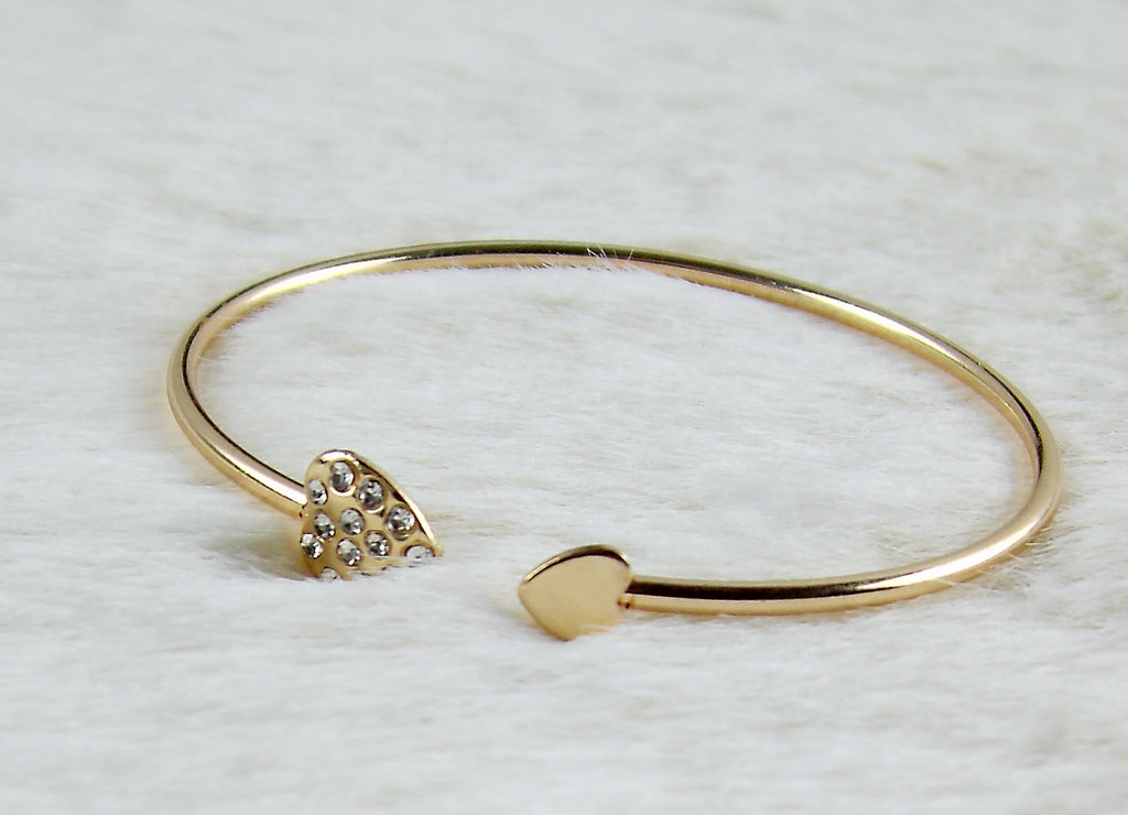Gouden ronde armband met mooie sluiting