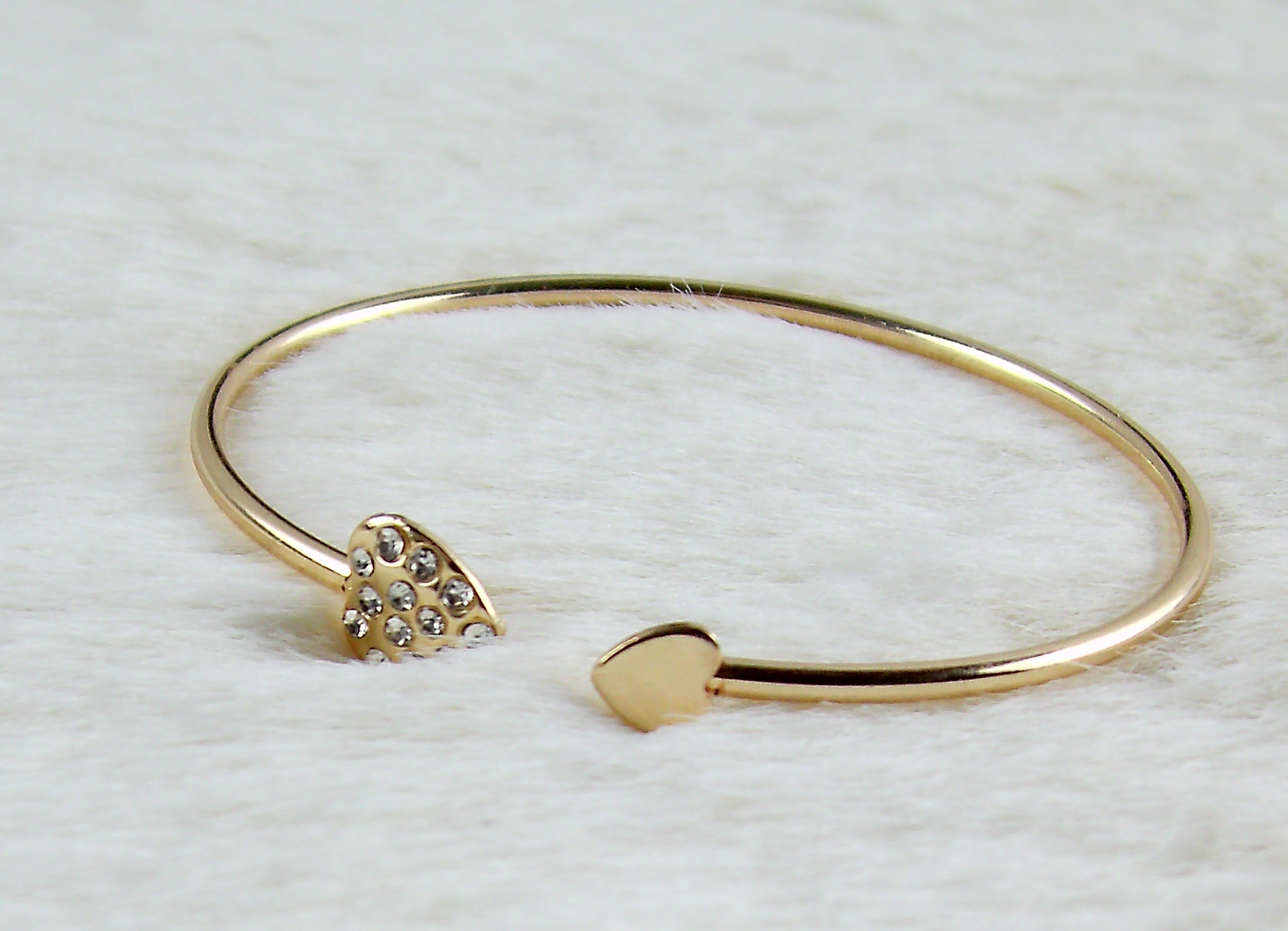 Gouden ronde armband met mooie sluiting