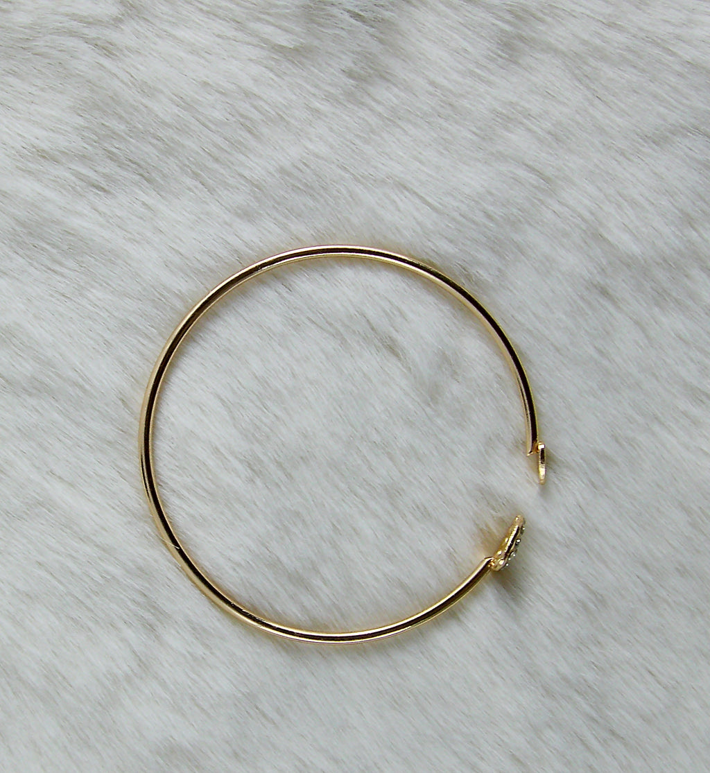 Gouden ronde armband met mooie sluiting