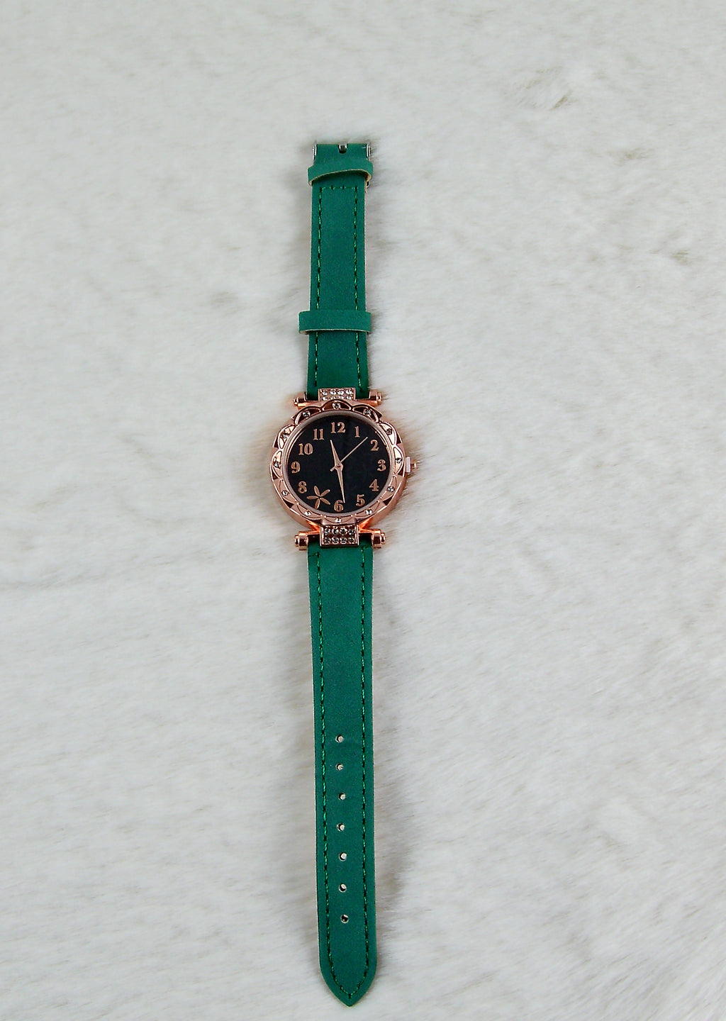 Groene horloge met bloemen display