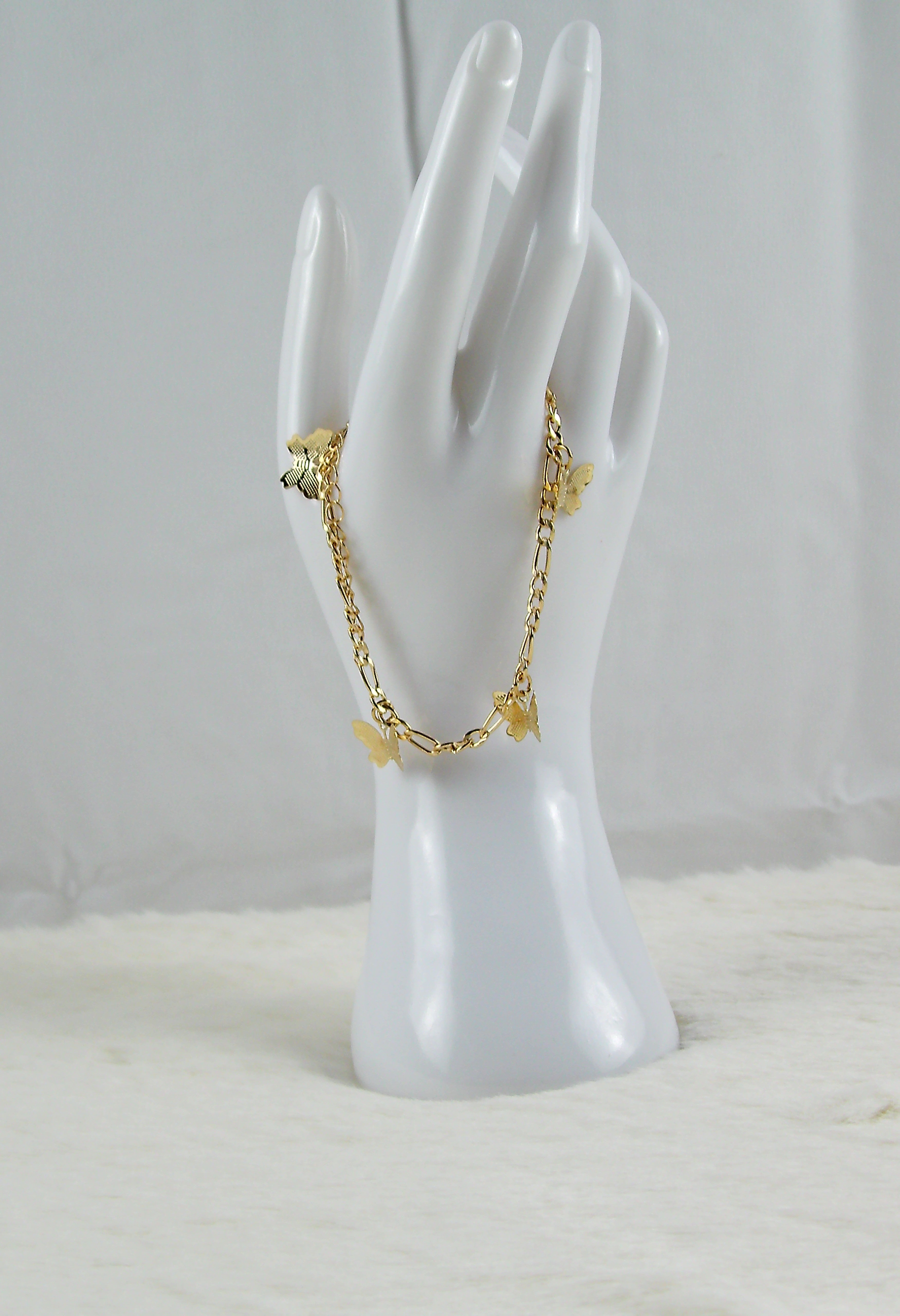 Gouden vlinder bedel armband