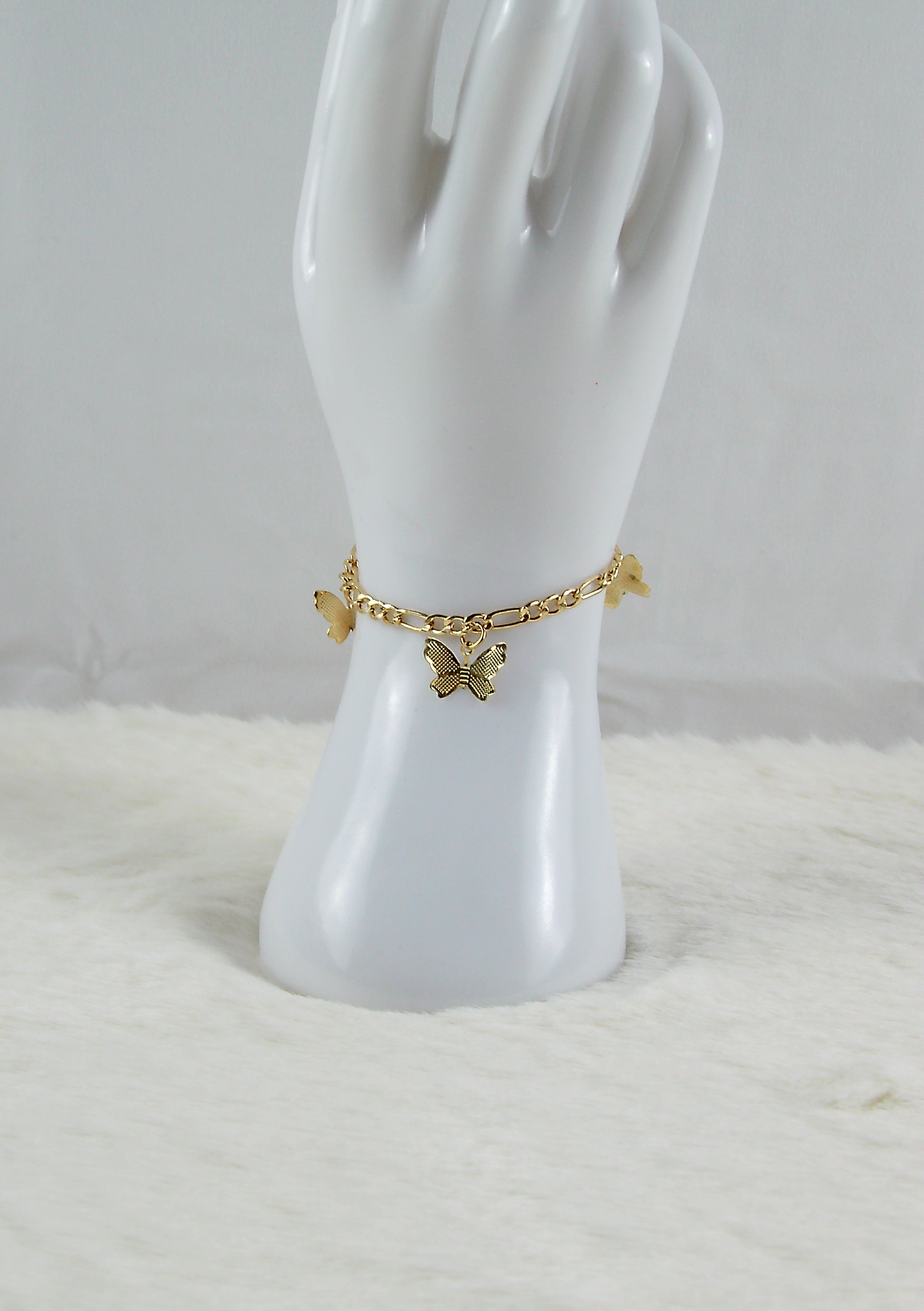 Gouden vlinder bedel armband