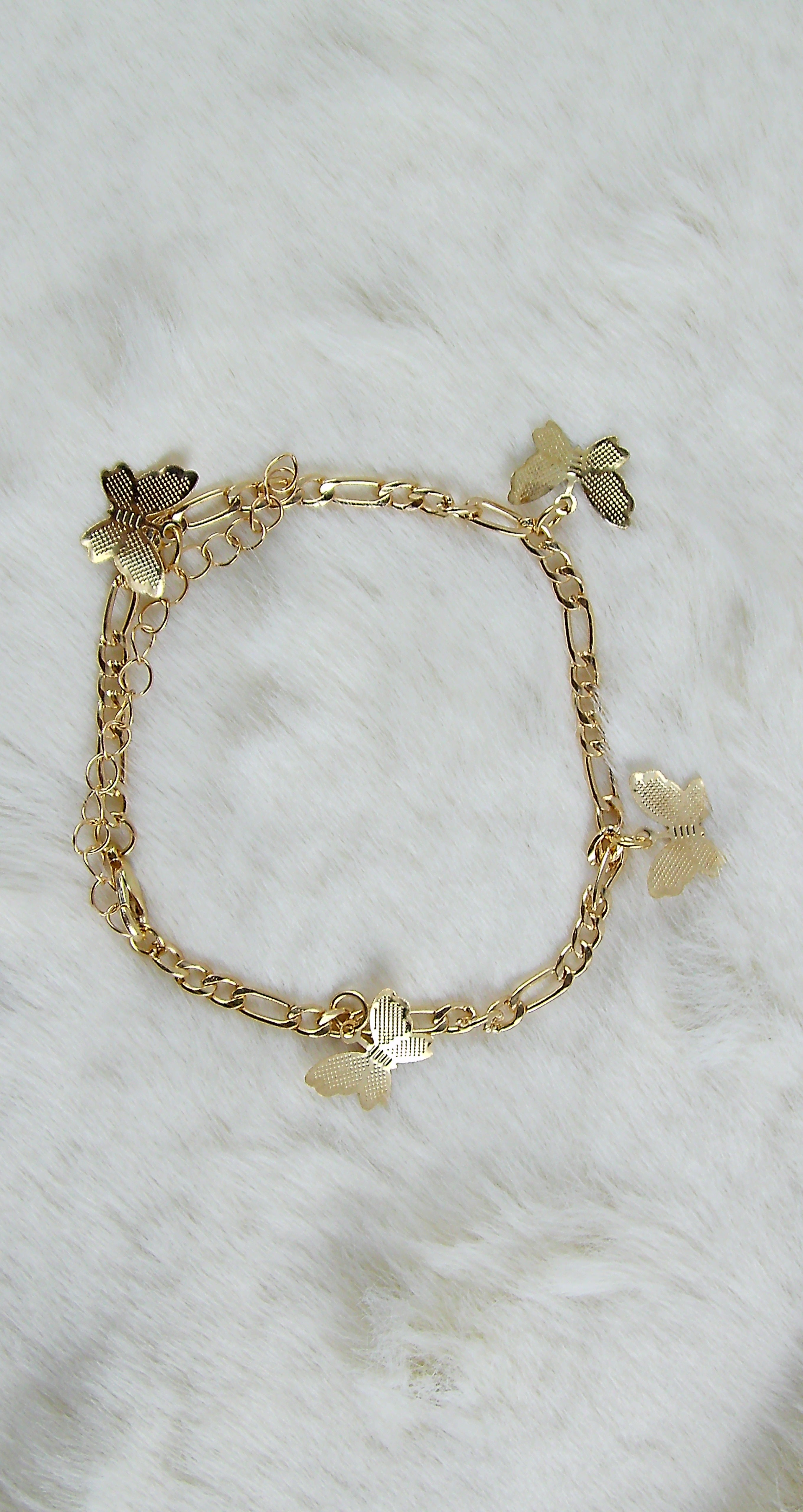 Gouden vlinder bedel armband