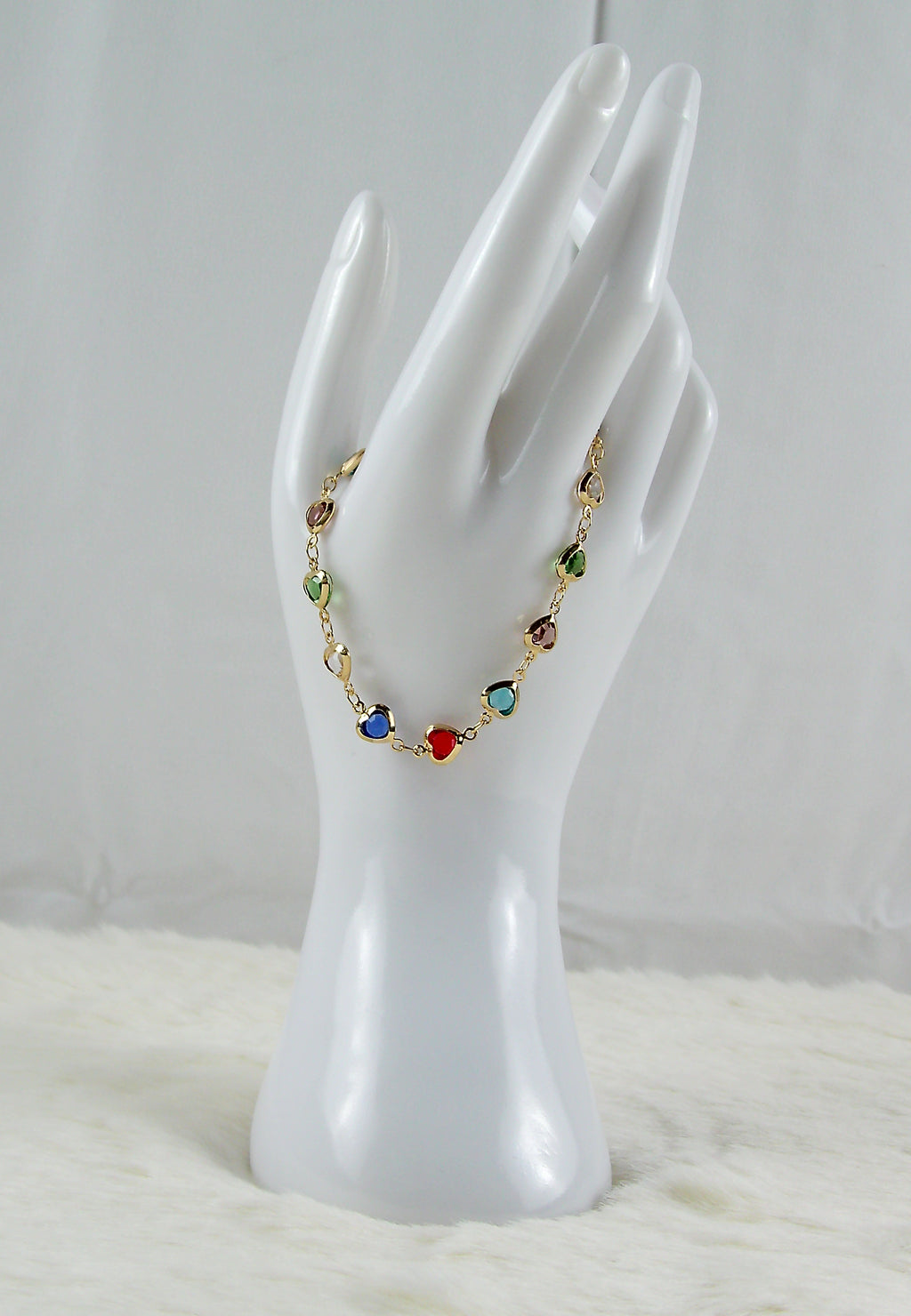 Gouden multicolor armband met hartje