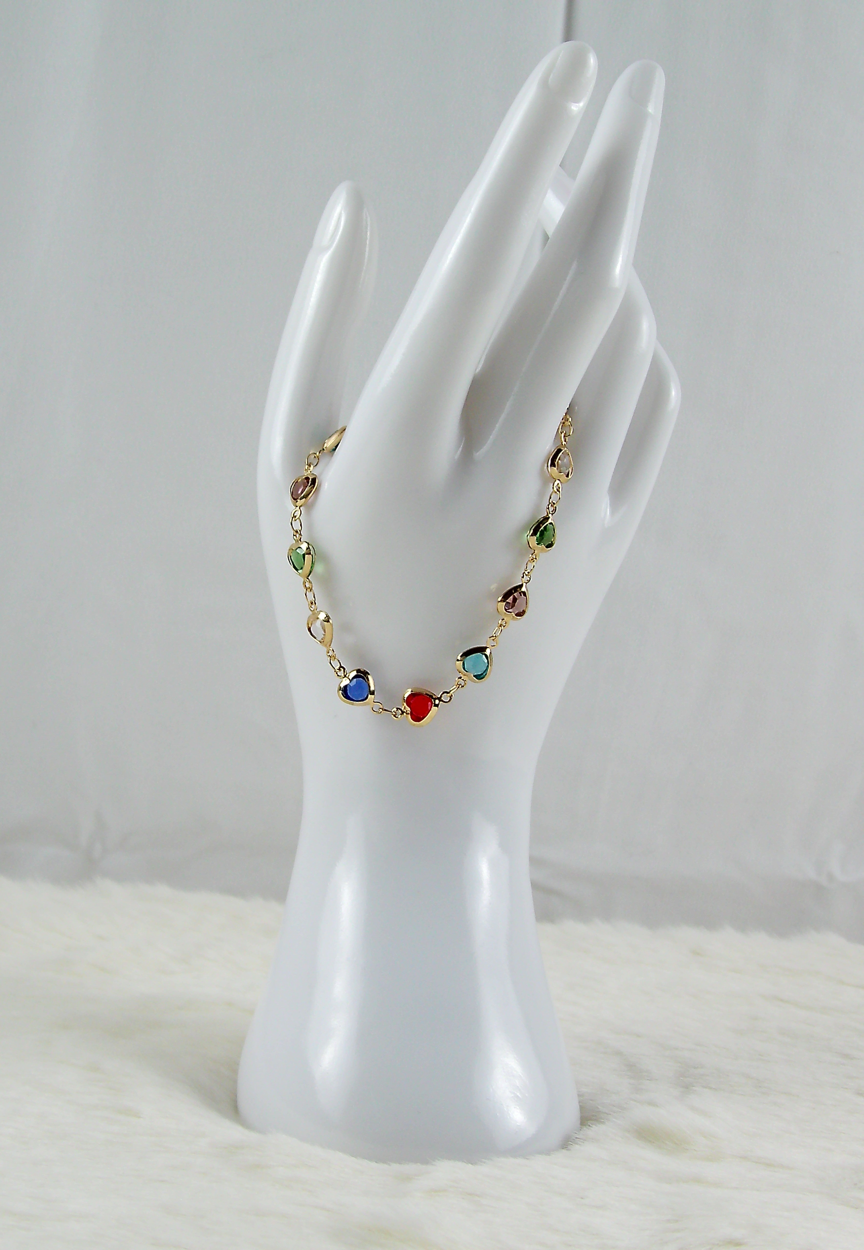 Gouden multicolor armband met hartje