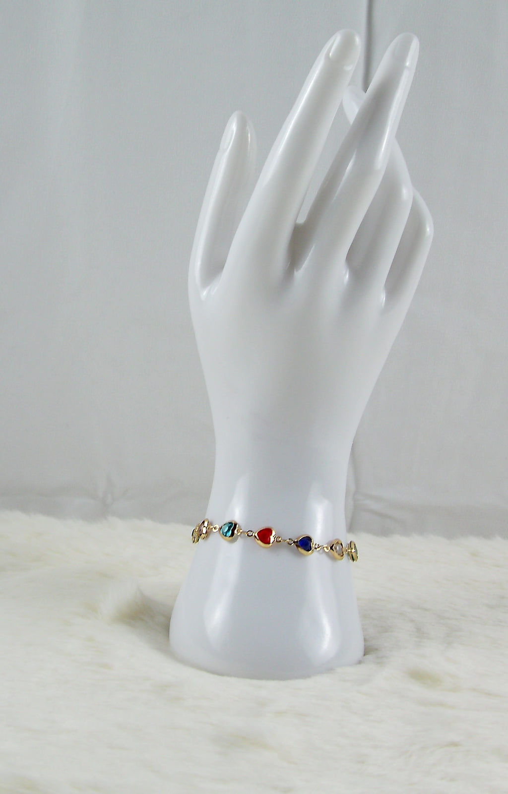 Gouden multicolor armband met hartje