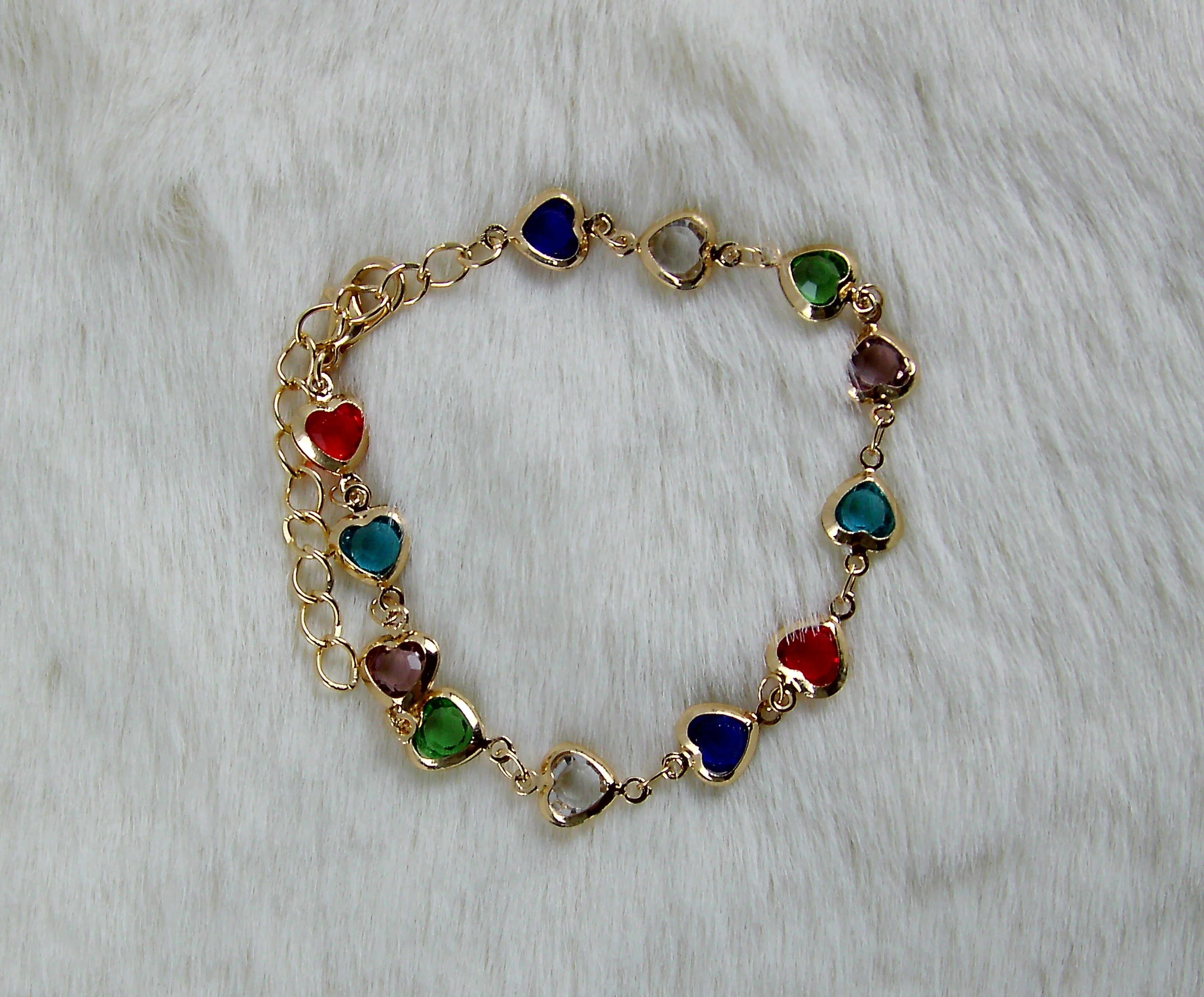 Gouden multicolor armband met hartje