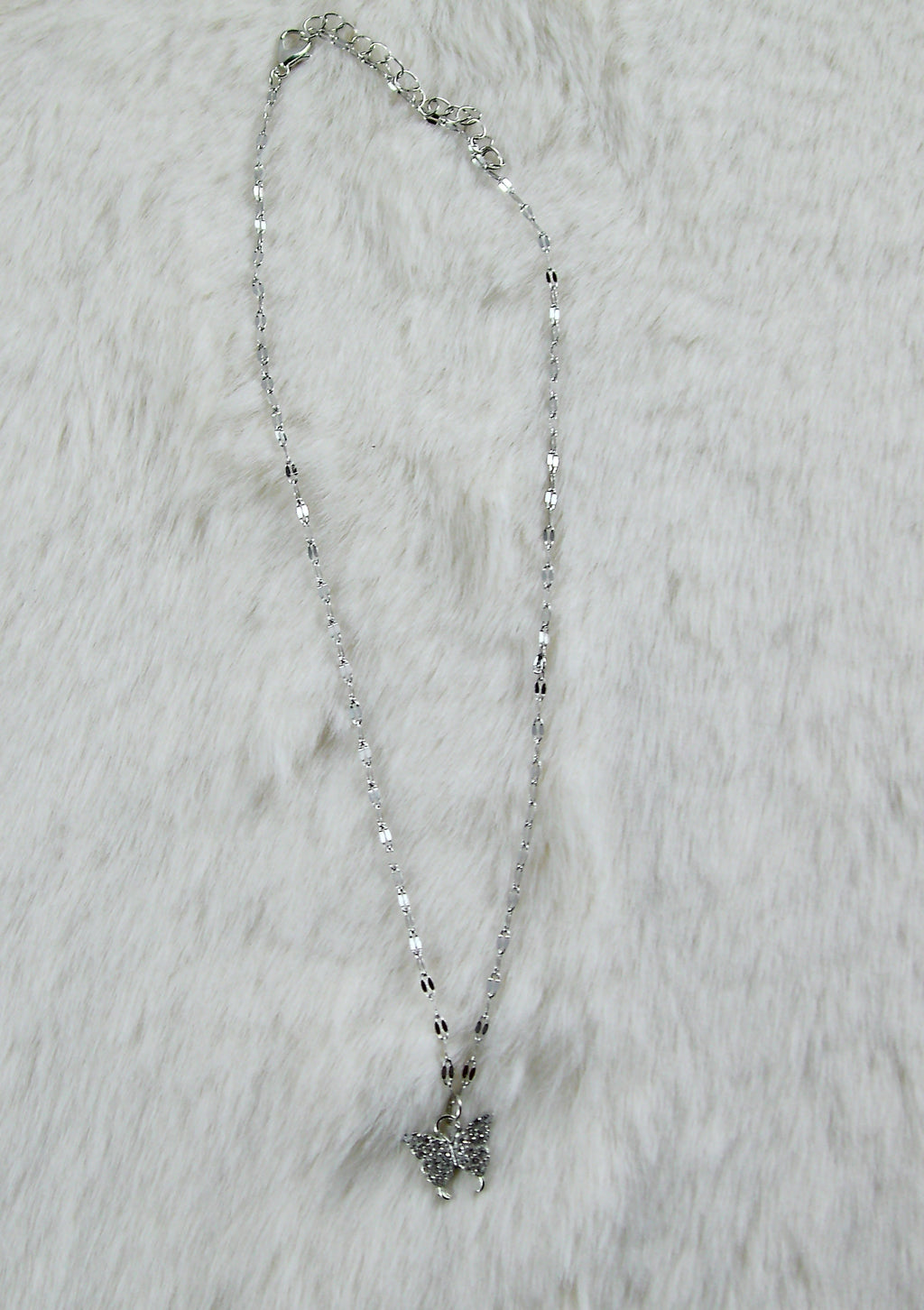 Zilveren ketting met diamanten vlinder