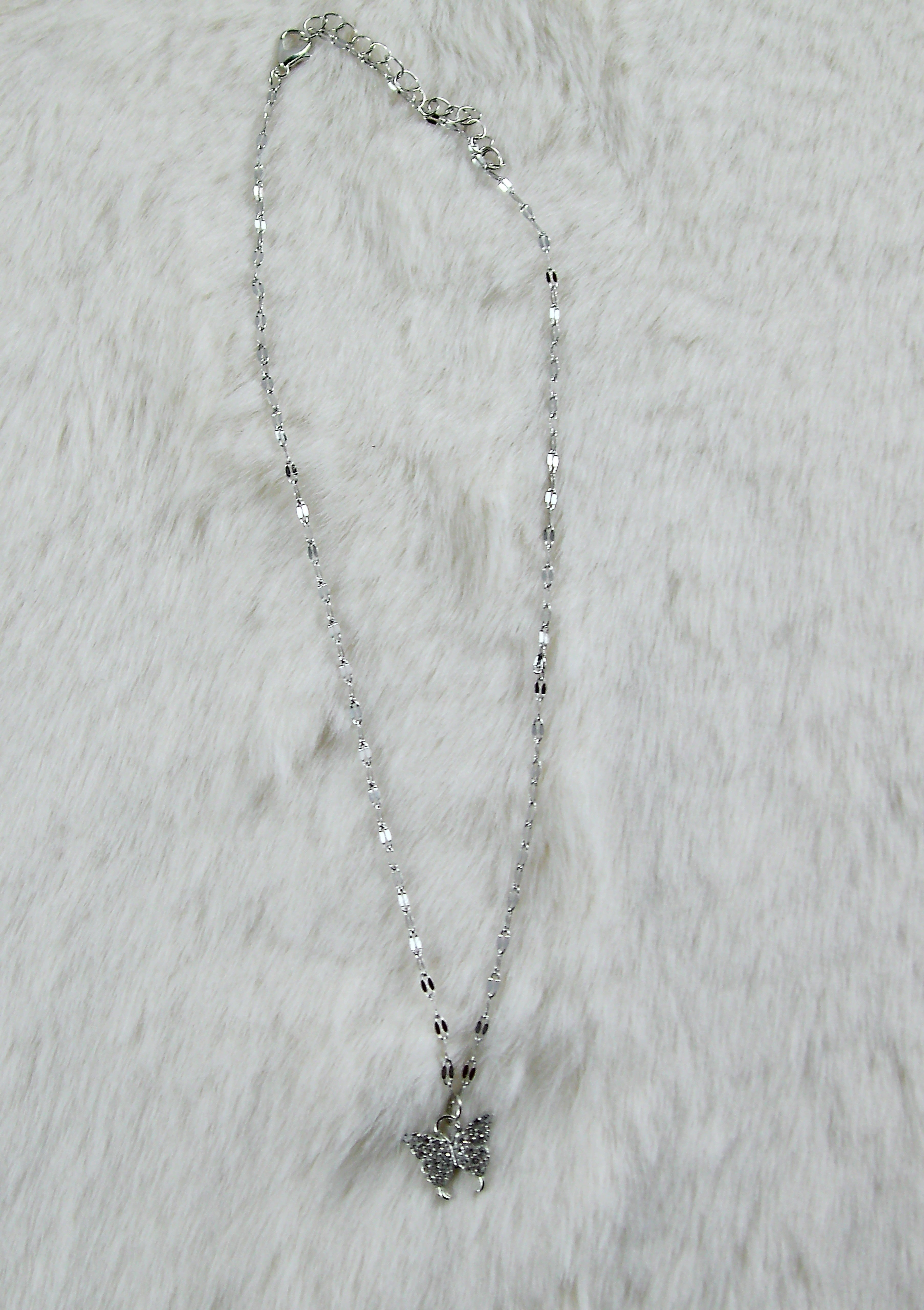 Zilveren ketting met diamanten vlinder