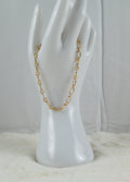 Gouden ringetjes armband met ovaaltjes