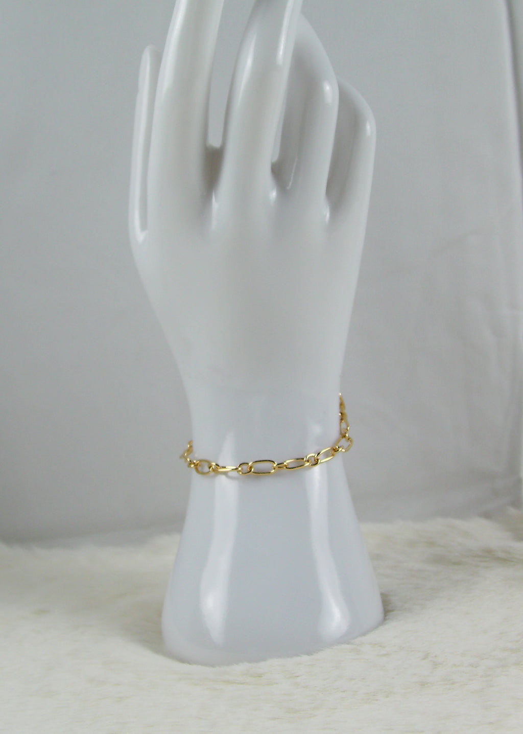 Gouden ringetjes armband met ovaaltjes