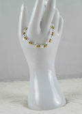 Goud met witte parel en ster kralen armband