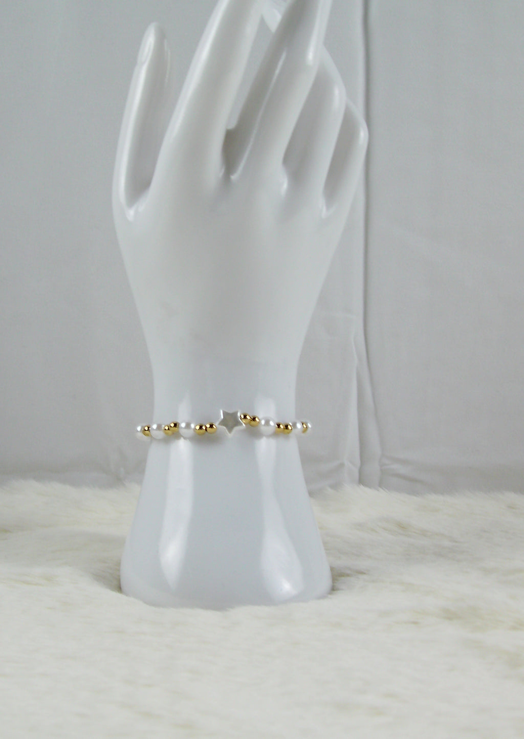 Goud met witte parel en ster kralen armband
