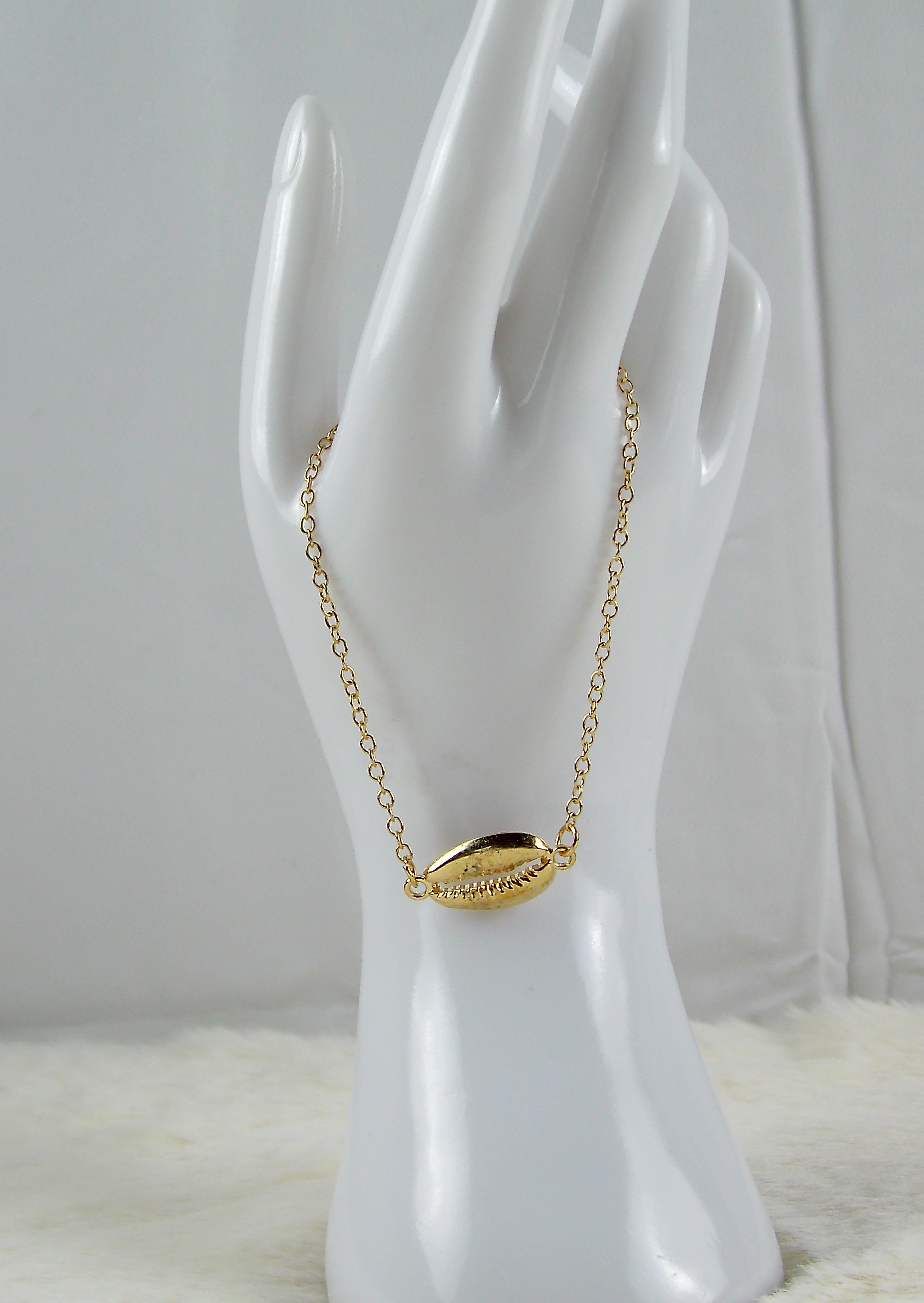 Gouden schelp armband