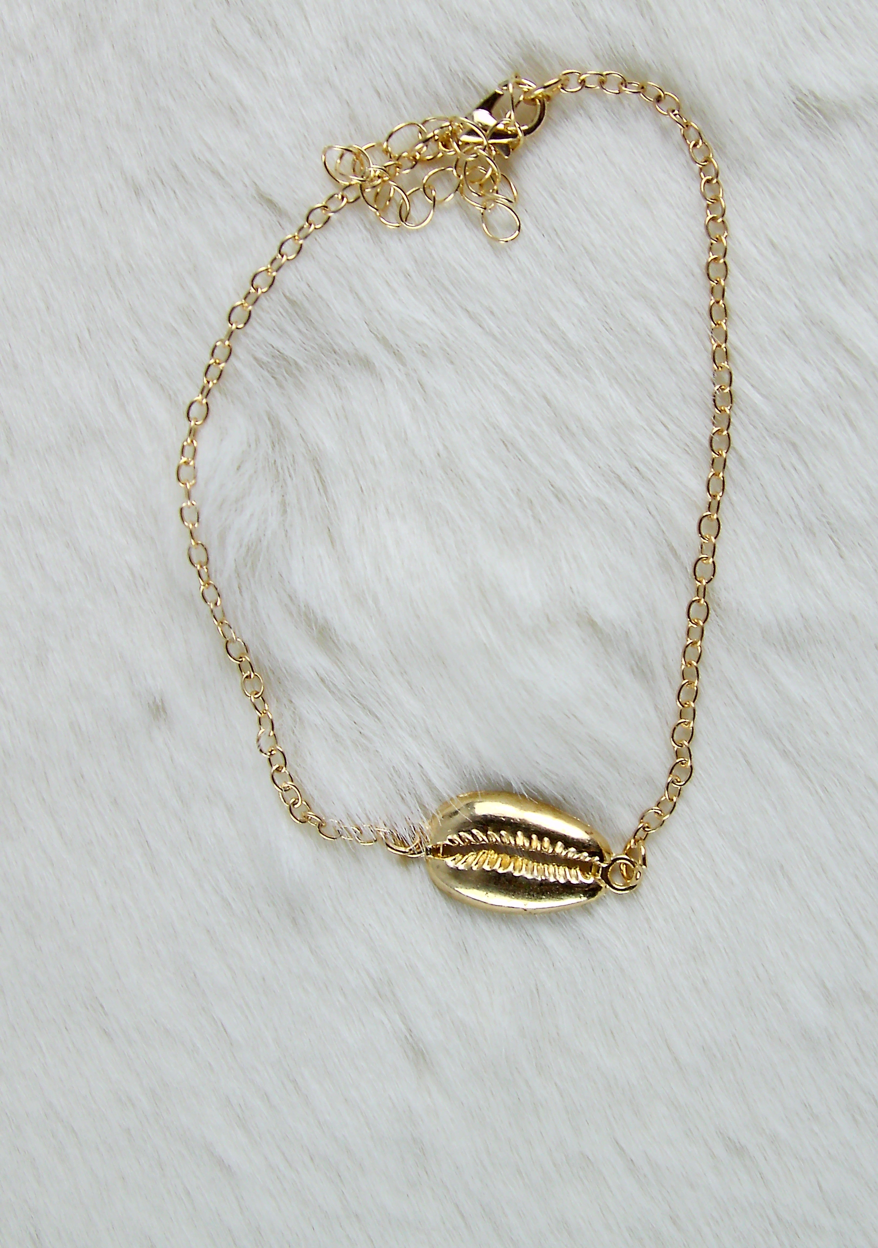 Gouden schelp armband