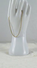Gouden armband met zilvere diamantjes dichte schakeltjes