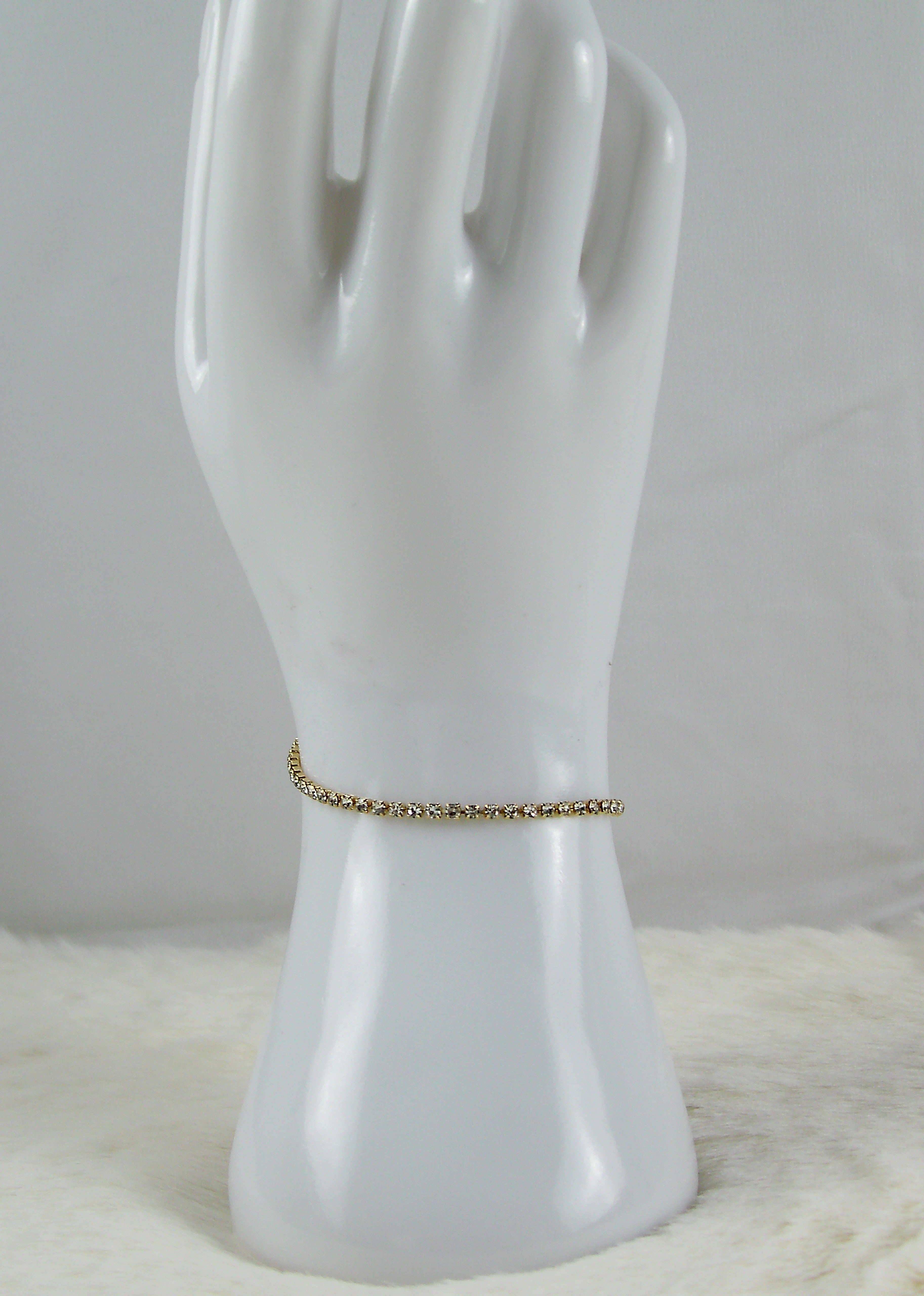 Gouden armband met zilvere diamantjes dichte schakeltjes