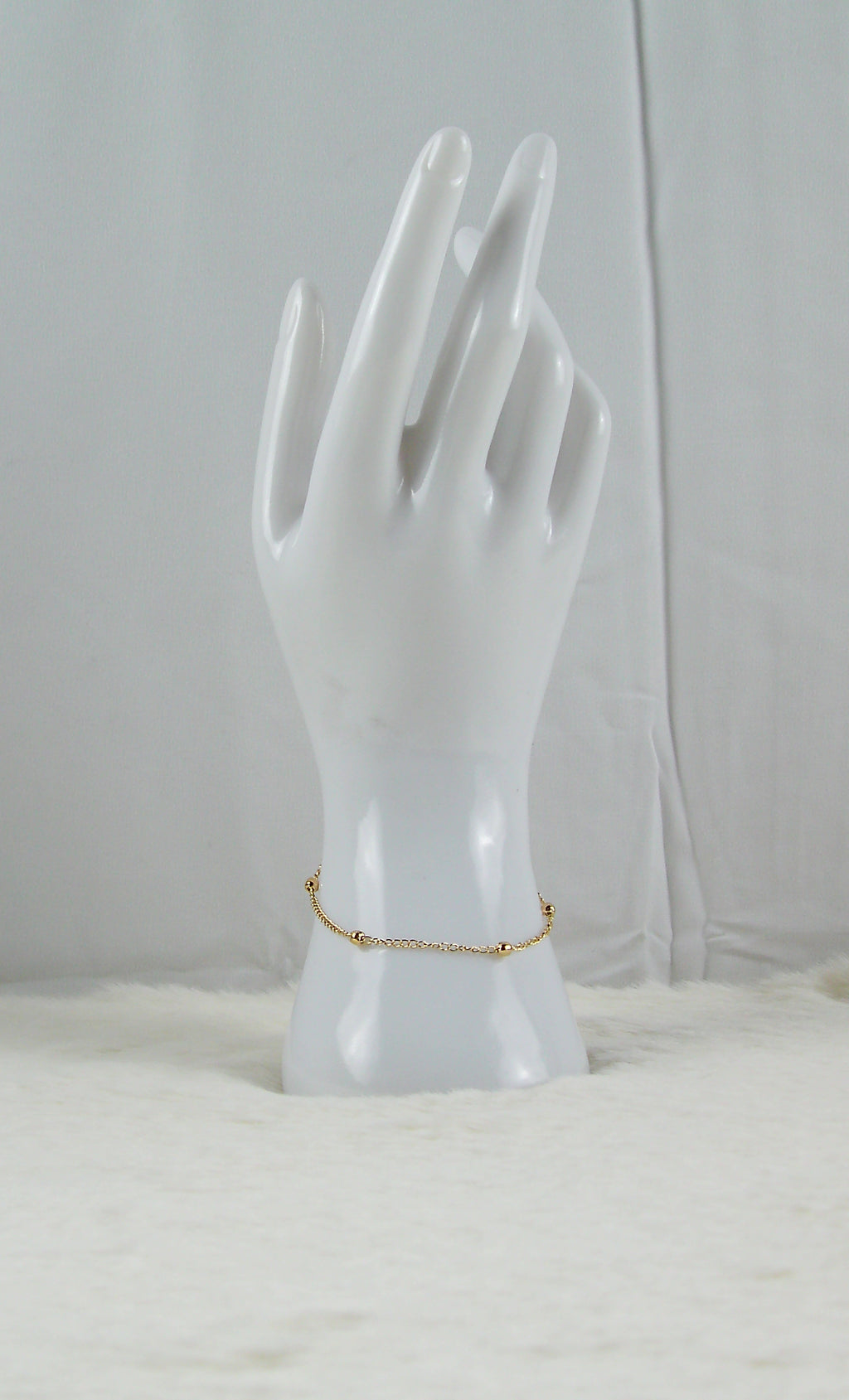 Gouden bolletjes armband