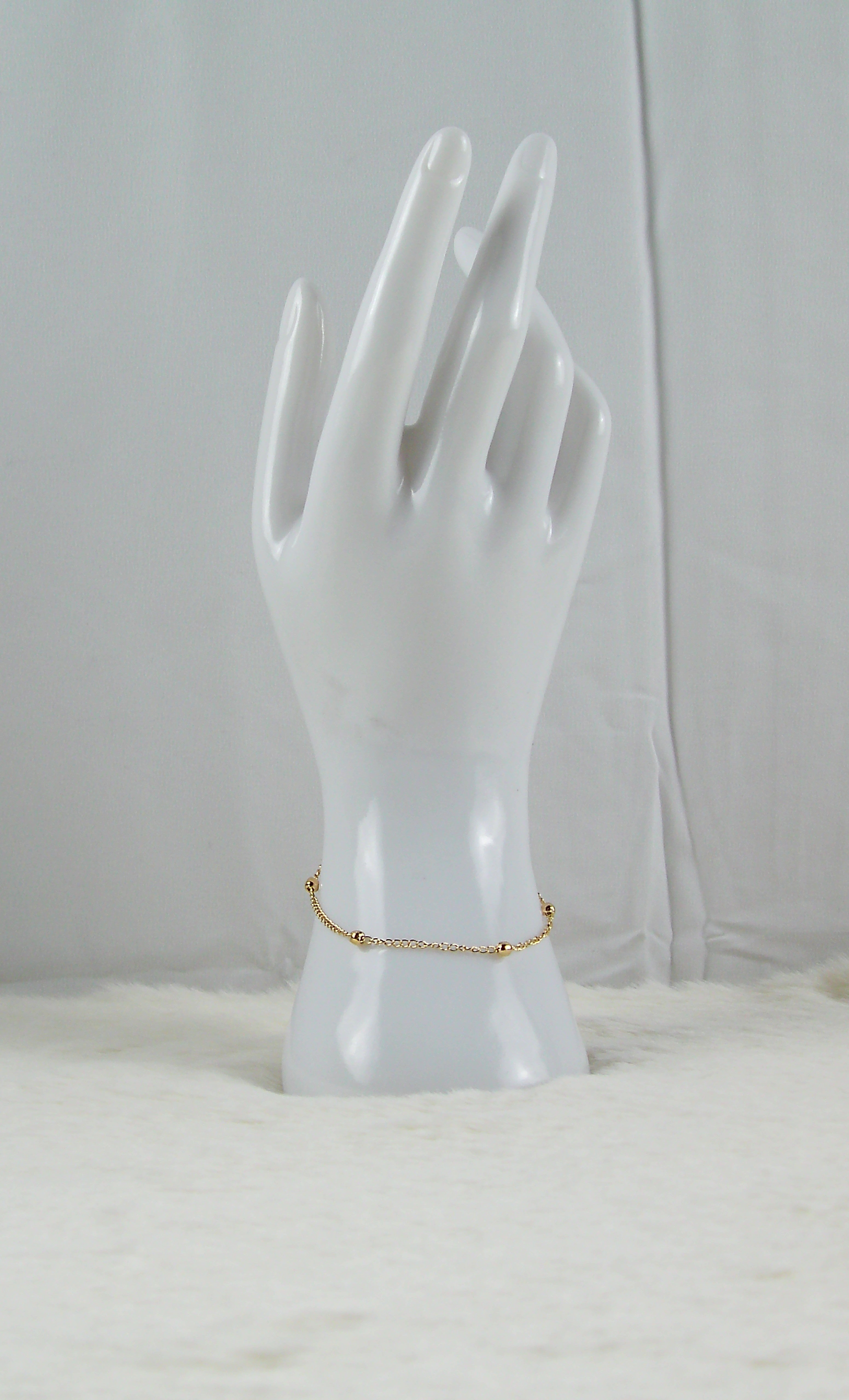 Gouden bolletjes armband