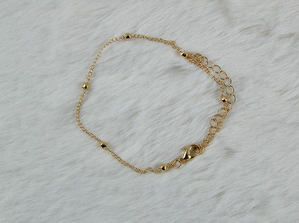 Gouden bolletjes armband