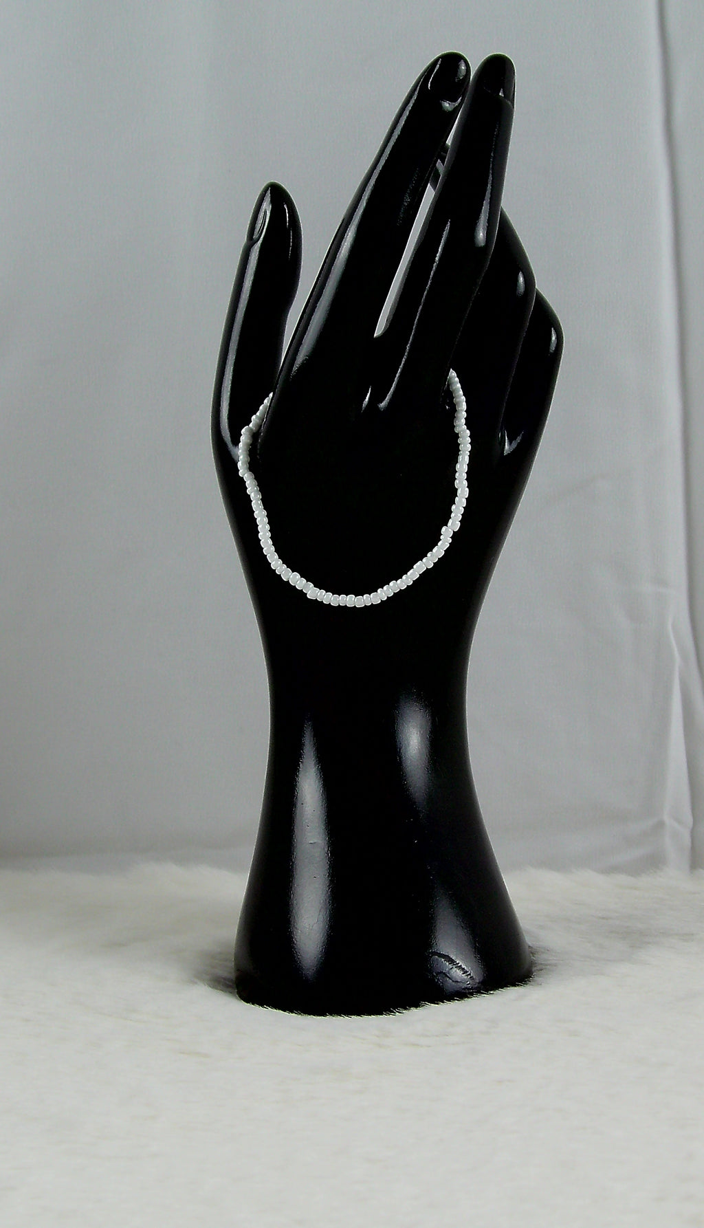 Witte kleine kralen armband