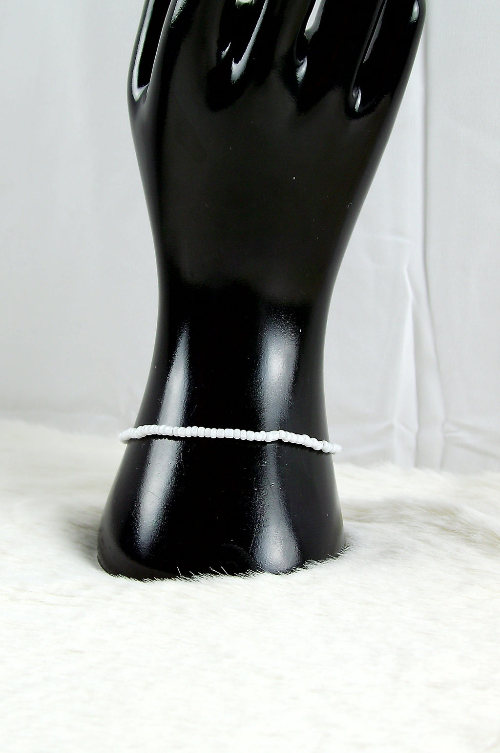 Witte kleine kralen armband