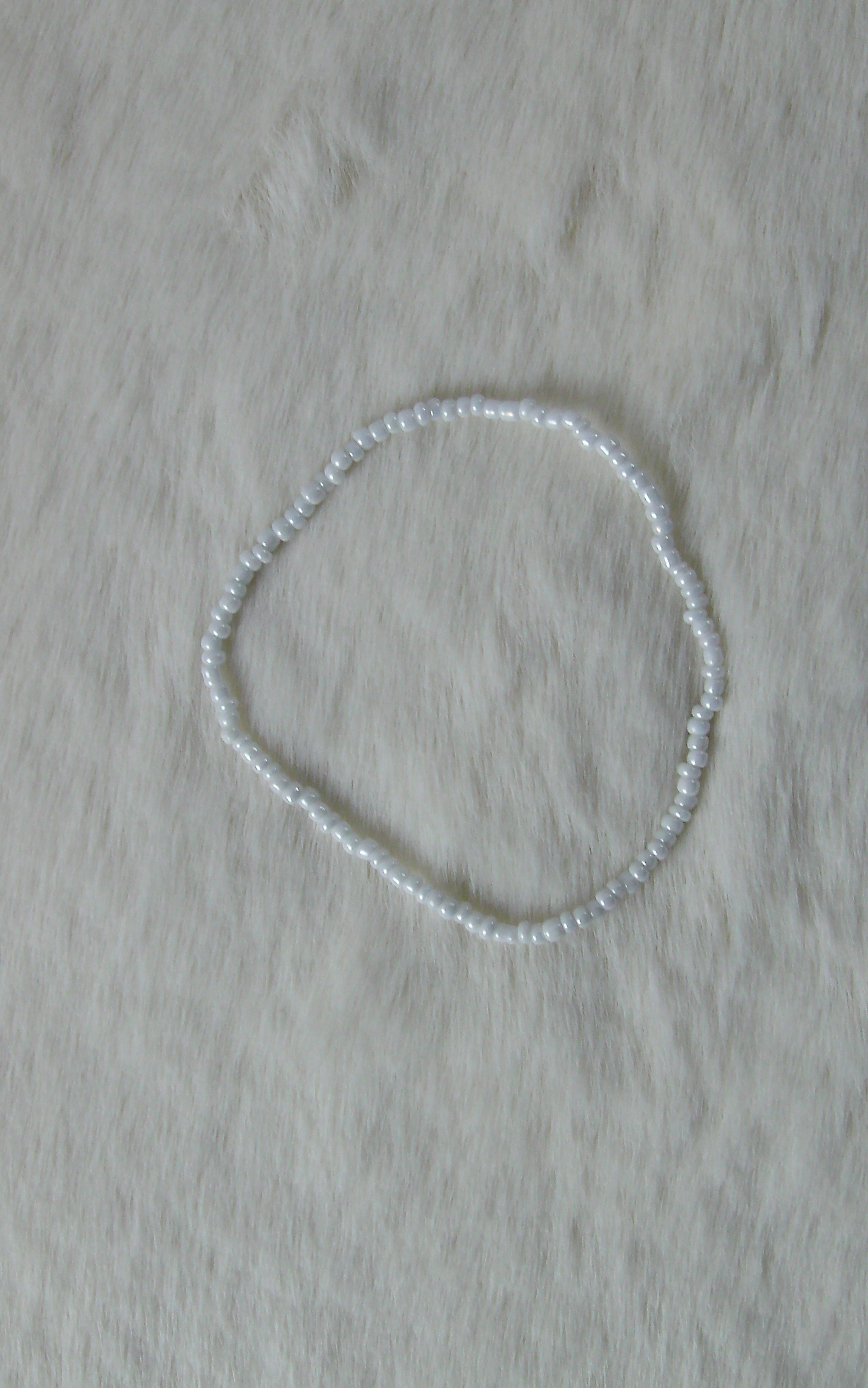 Witte kleine kralen armband