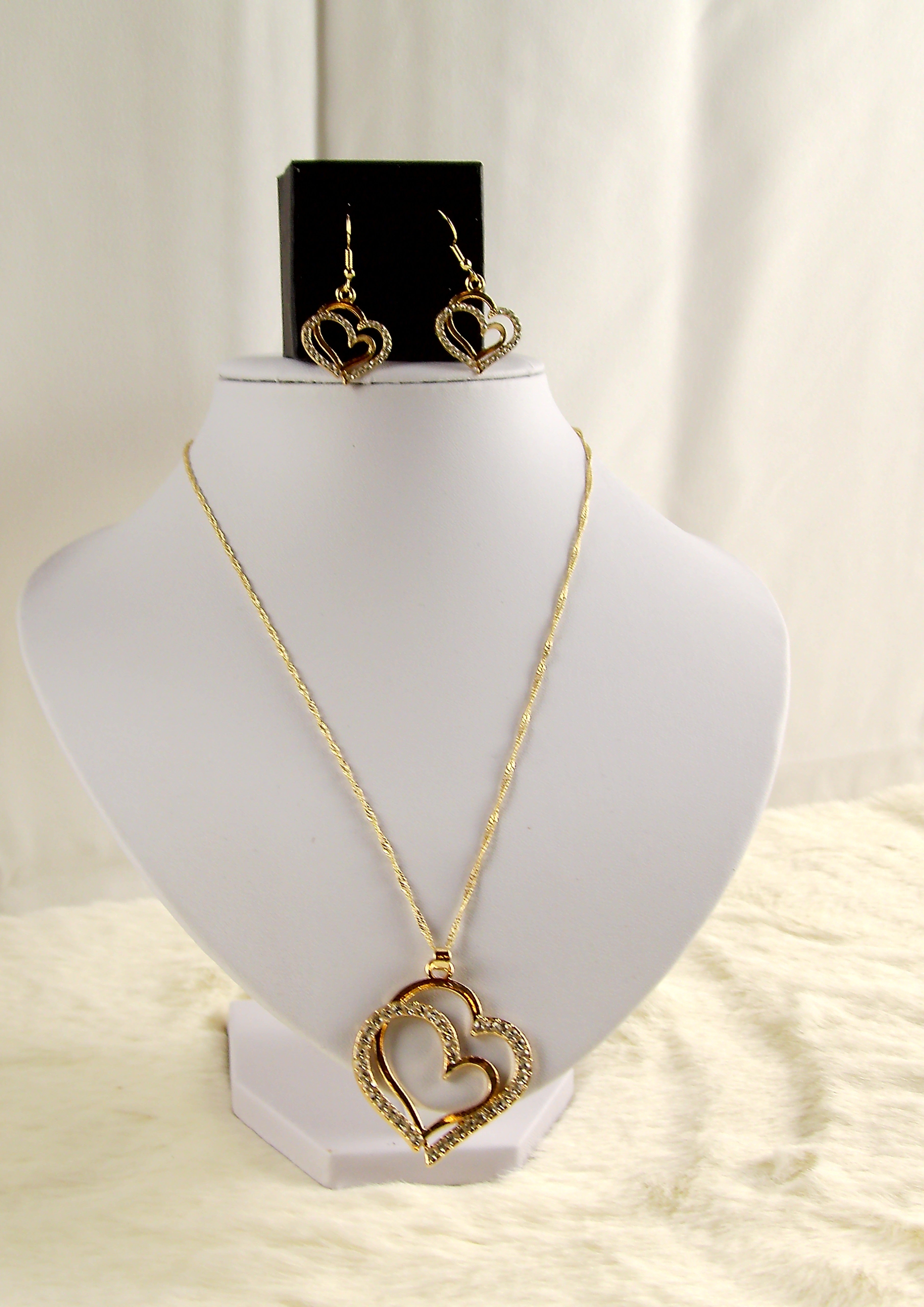 2 delig hartjes set goud oorbellen ketting