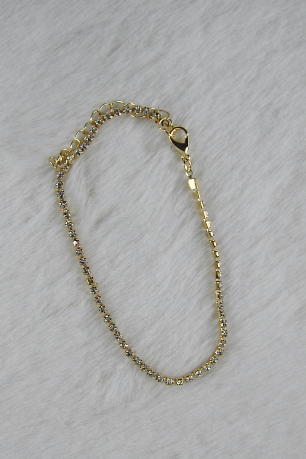 Gouden armband met zilvere diamantjes dichte schakeltjes